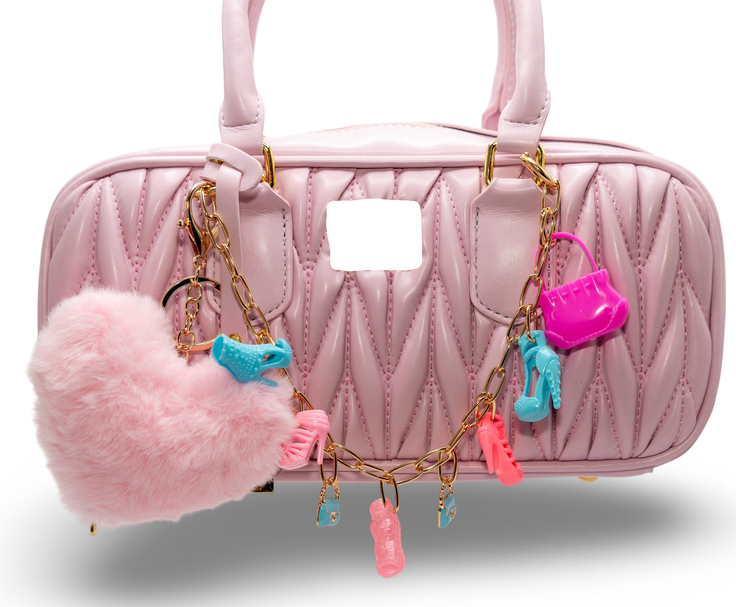 A pink bag with a custom-made chain charm featuring various pendants and a fluffy element attached to it.